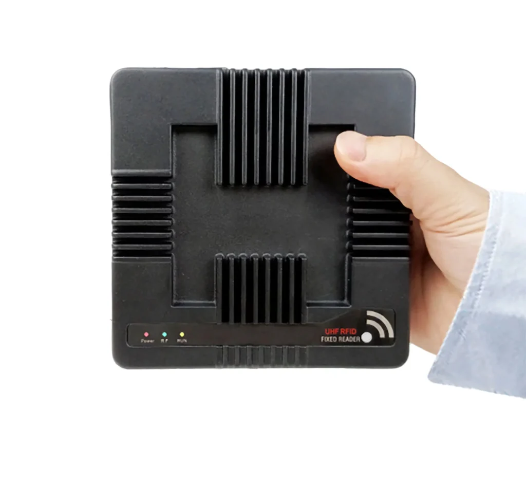 VF-747P UHF Fixed RFID Reader(4-Port) 2 Person holding an RFID reader from RFID Reader.io, showing compact design and clear interface