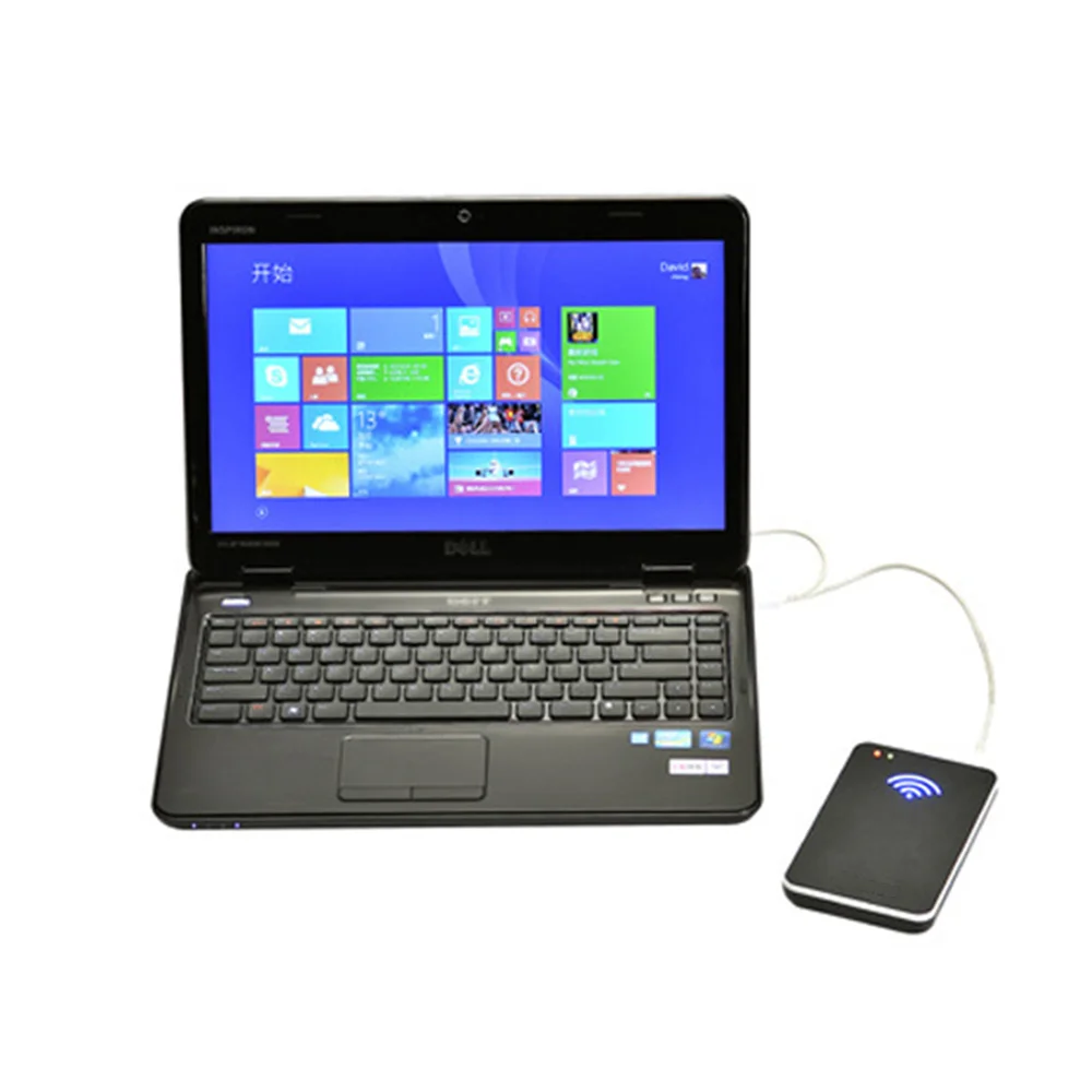 USB RFID Reader Connected to Laptop USB RFID reader plugged into laptop